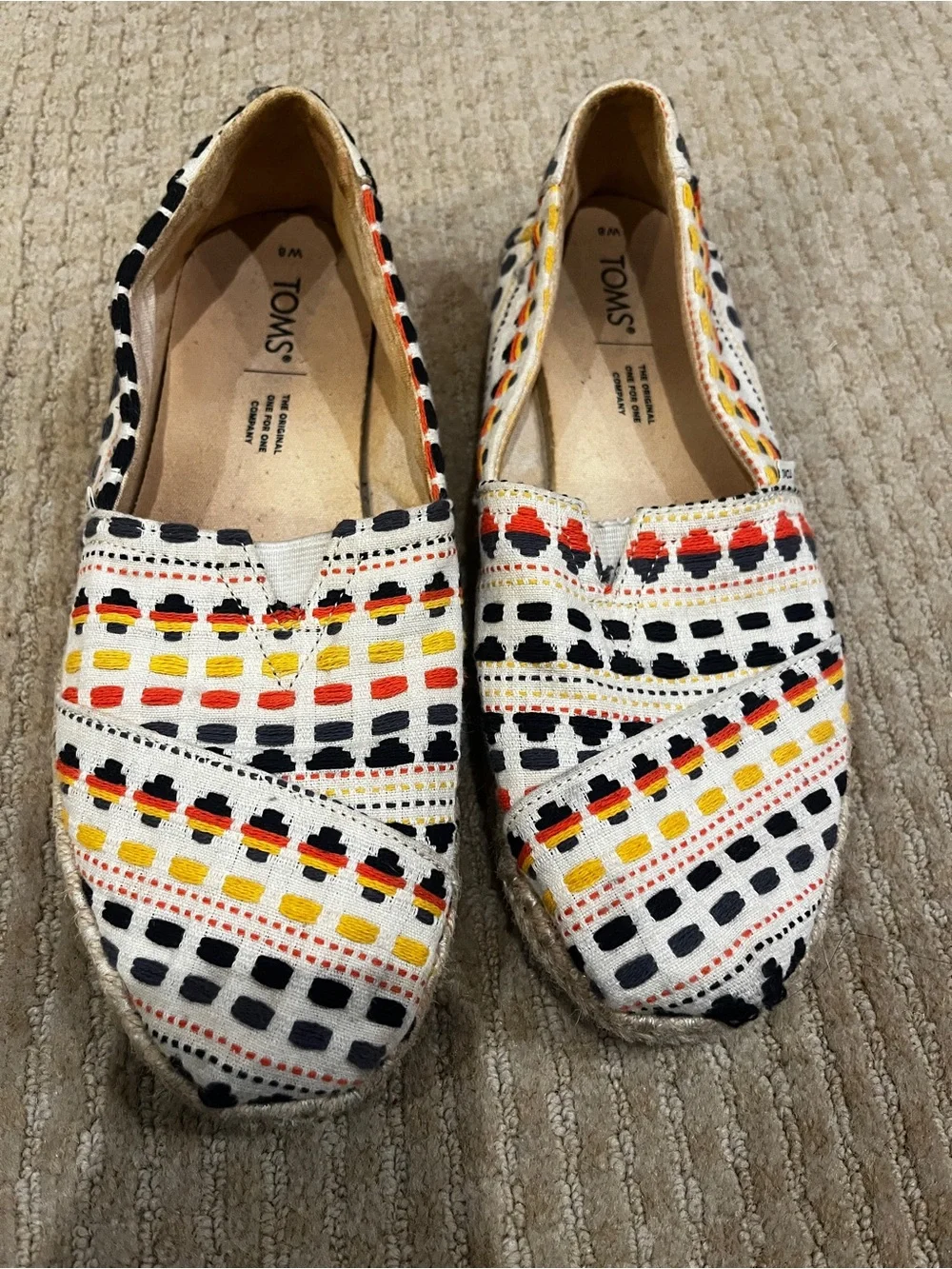 Toms Women Slip-On Canvas Shoes in White with Black, Yellow & Red Pattern